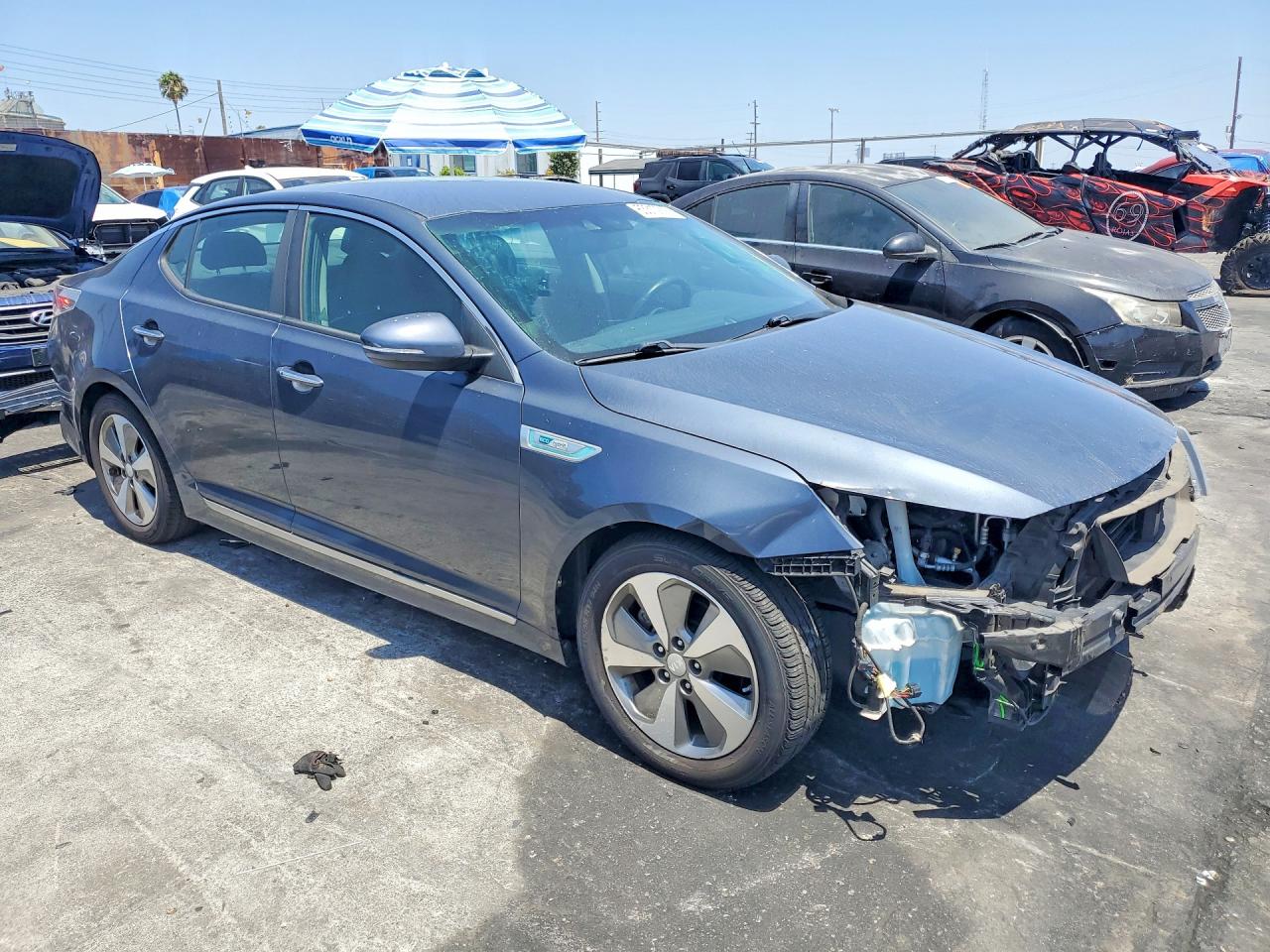 2015 Kia Optima Hybrid Blue vin: KNAGN4ADXF5080635