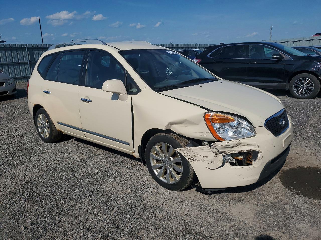 2012 Kia Rondo Cream vin: KNAHH8A65C7408564