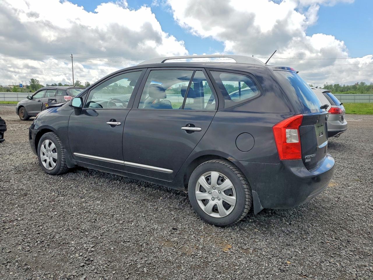 2012 Kia Rondo Black vin: KNAHH8A81C7401189
