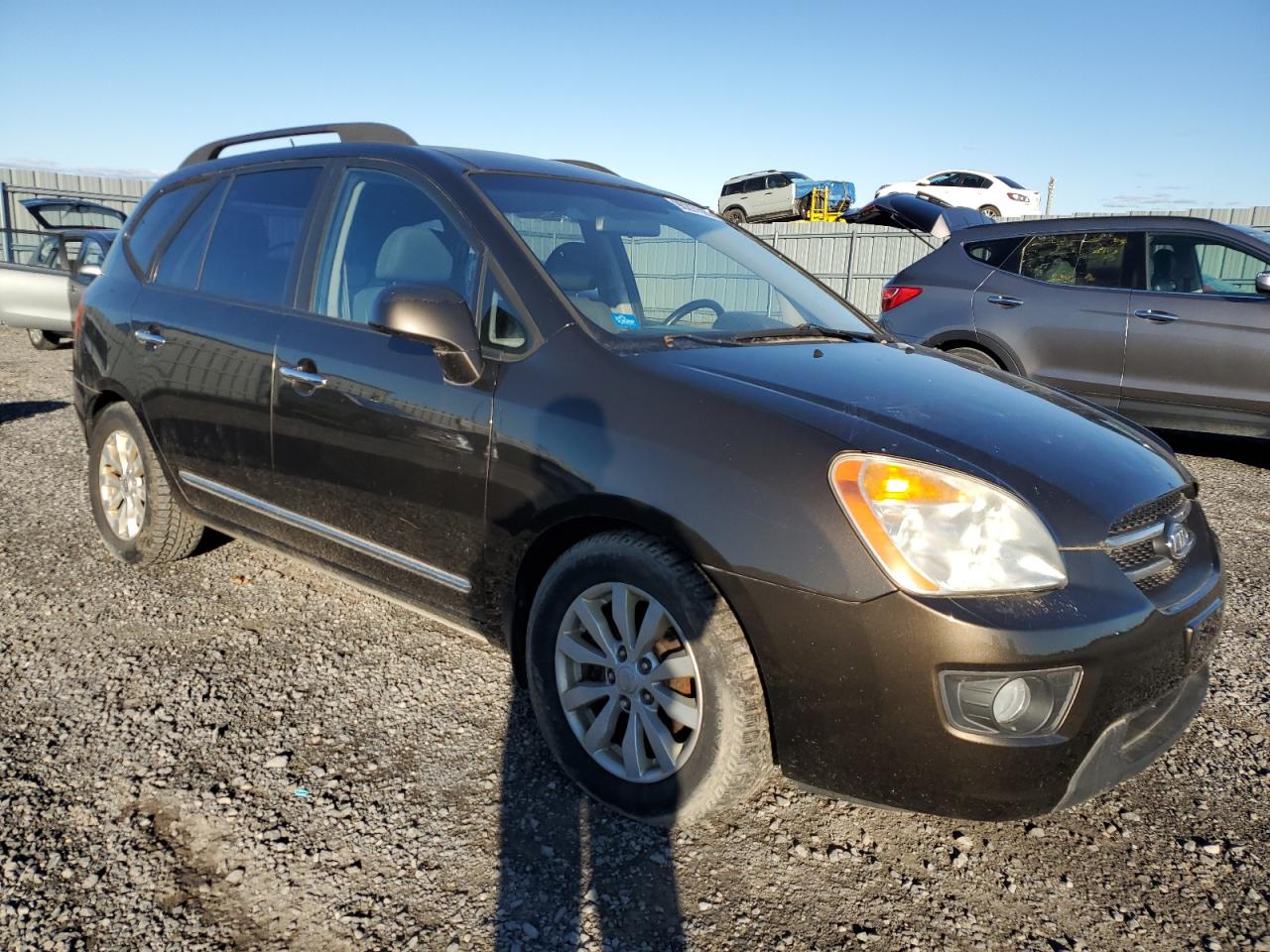 2010 Kia Rondo Ex Brown vin: KNAHH8C61A7322775