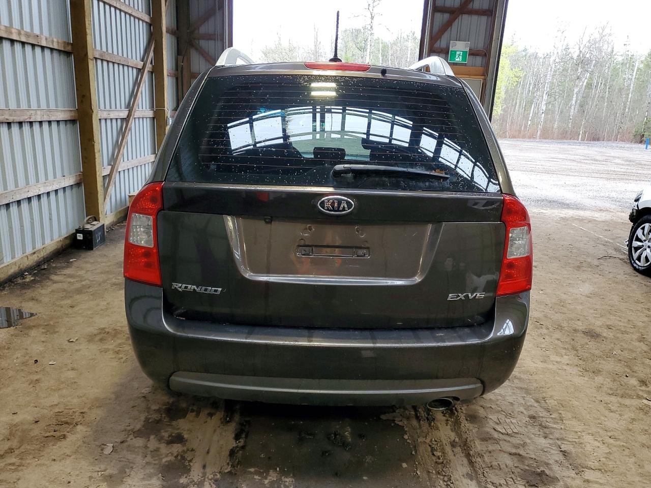 2011 Kia Rondo Коричневый vin: KNAHH8C61B7343854