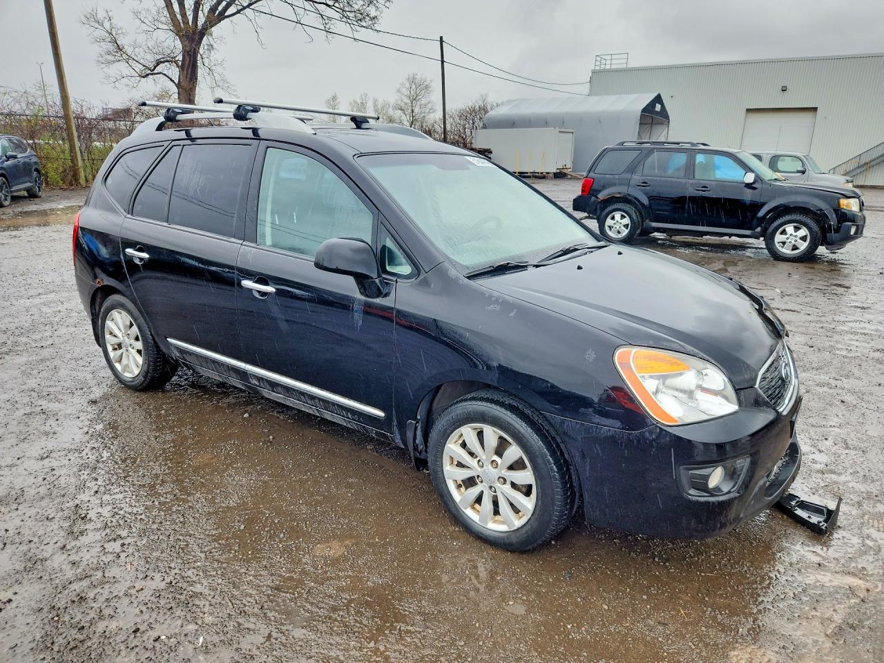2012 Kia Rondo Black vin: KNAHH8C6XC7404670