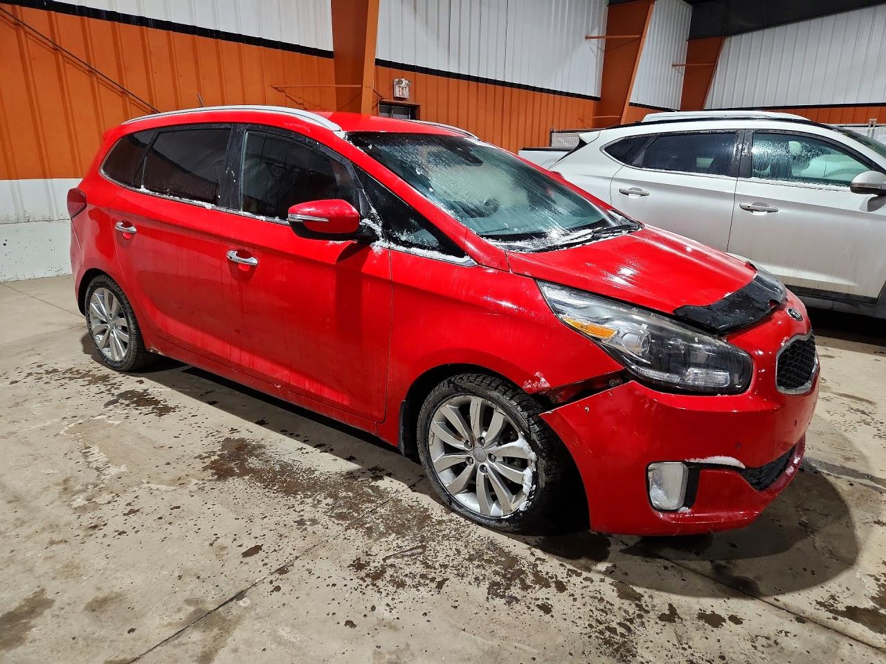 2015 Kia Rondo Red vin: KNAHU8A32F7077416