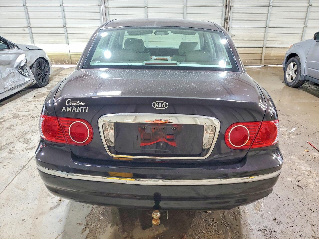 2004 Kia Amanti Base Burgundy vin: KNALD124845029064