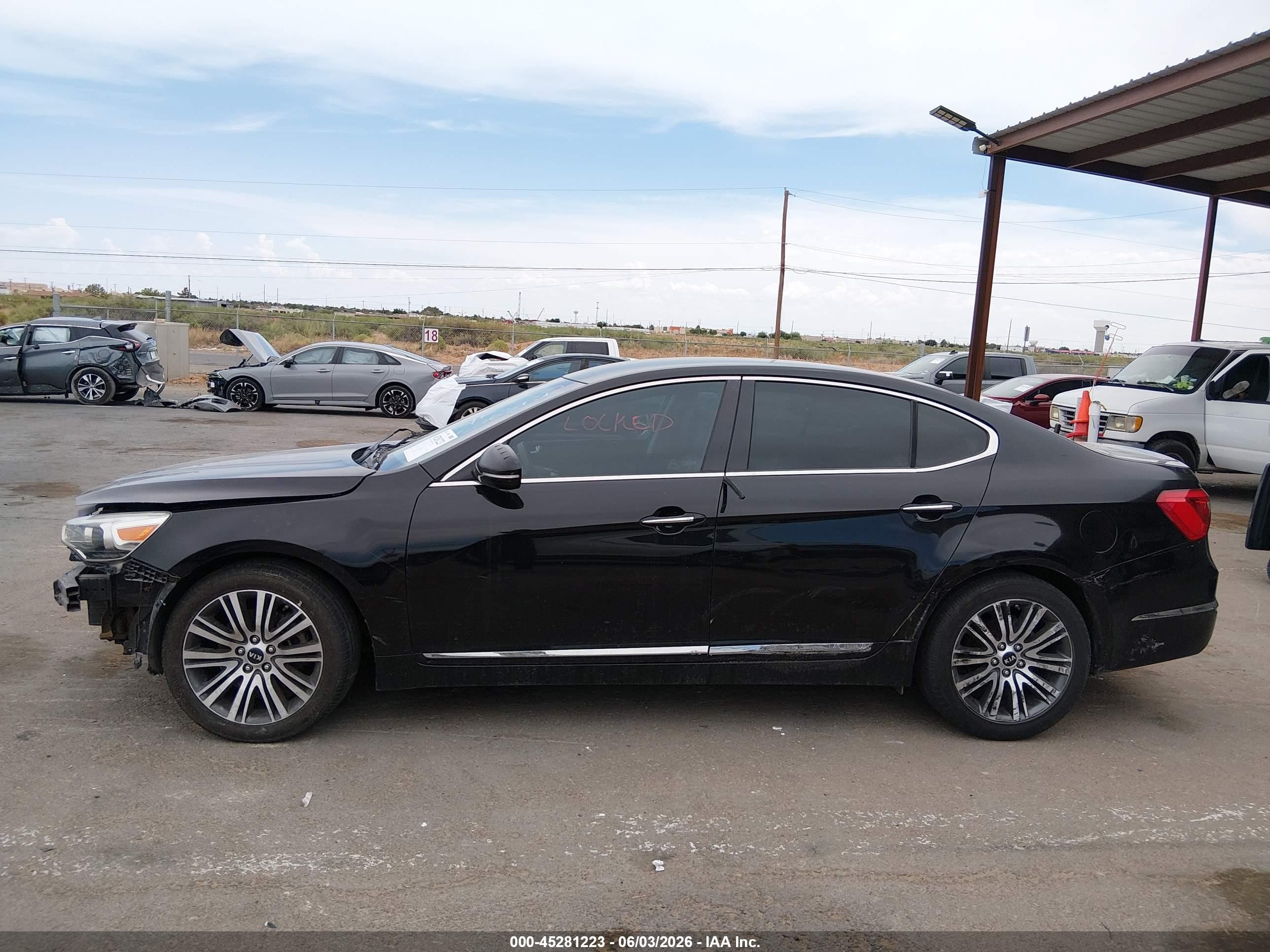 2014 Kia Cadenza Premium Black vin: KNALN4D74E5161889
