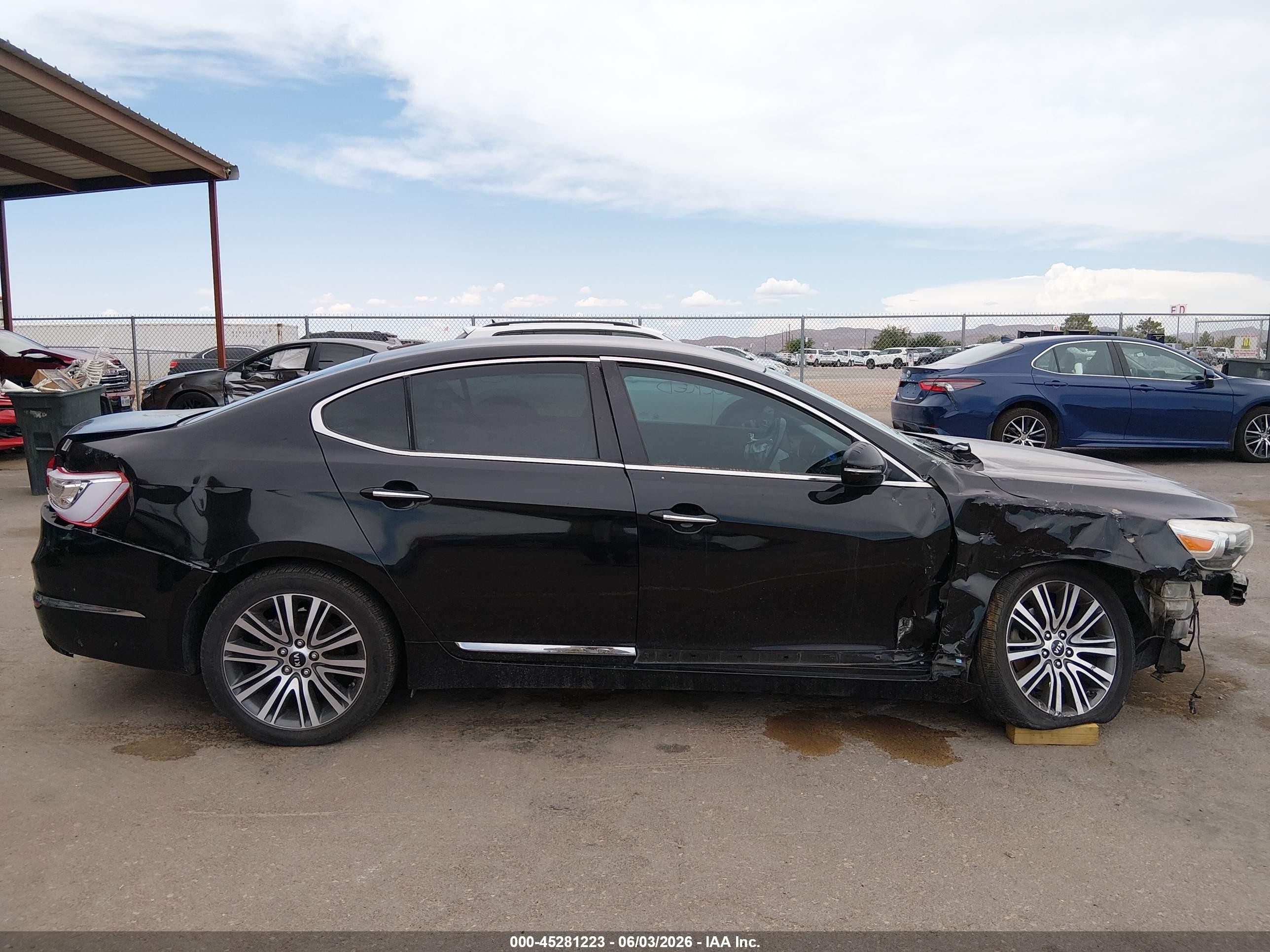 2014 Kia Cadenza Premium Black vin: KNALN4D74E5161889