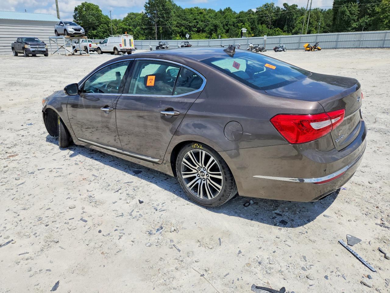 2014 Kia Cadenza Premium Коричневый vin: KNALN4D77E5120463