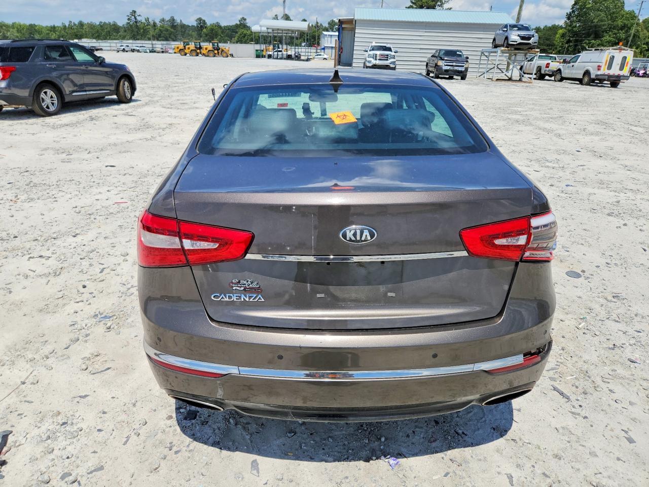 2014 Kia Cadenza Premium Коричневый vin: KNALN4D77E5120463
