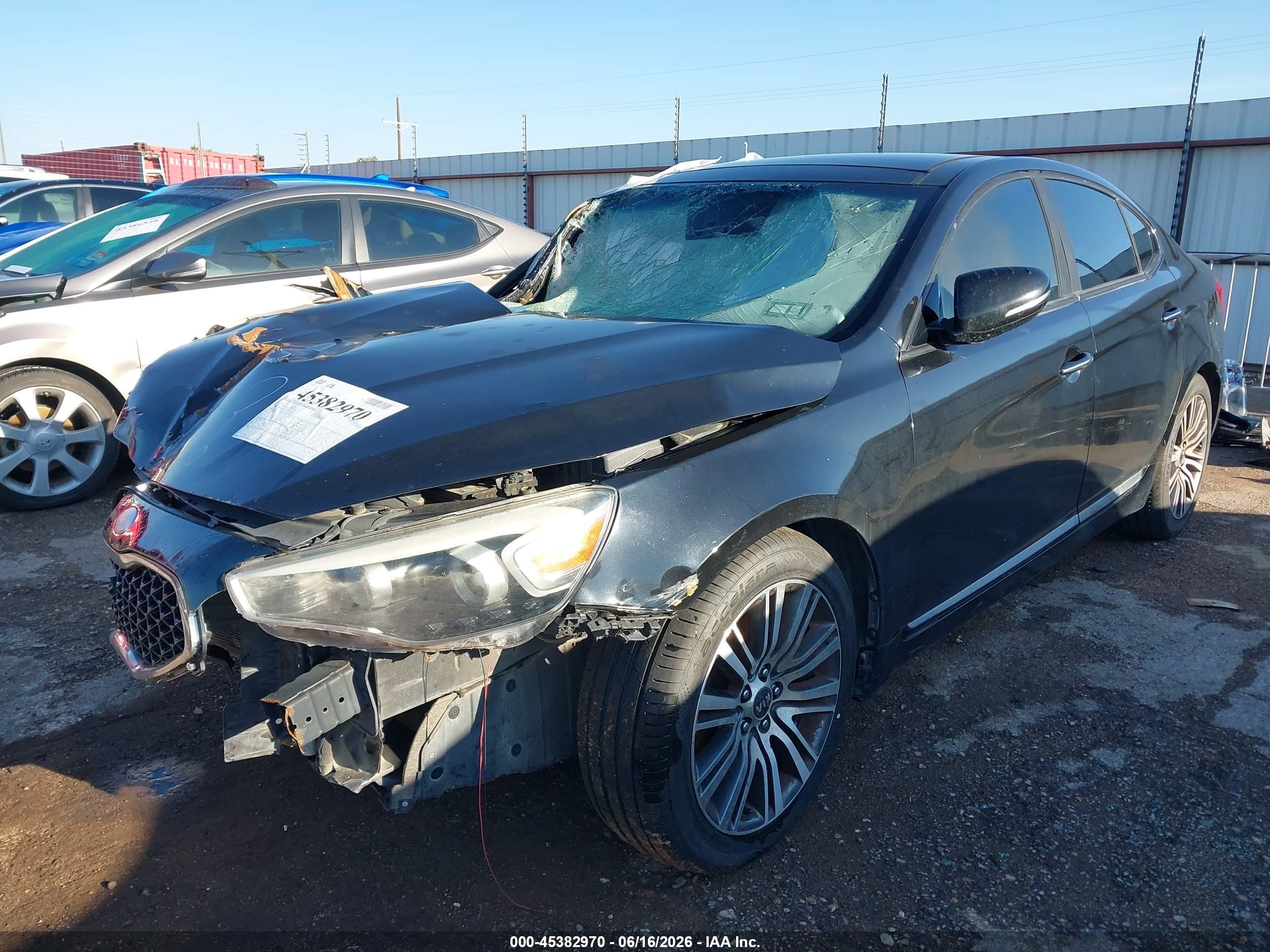 2014 Kia Cadenza Premium Black vin: KNALN4D79E5120643