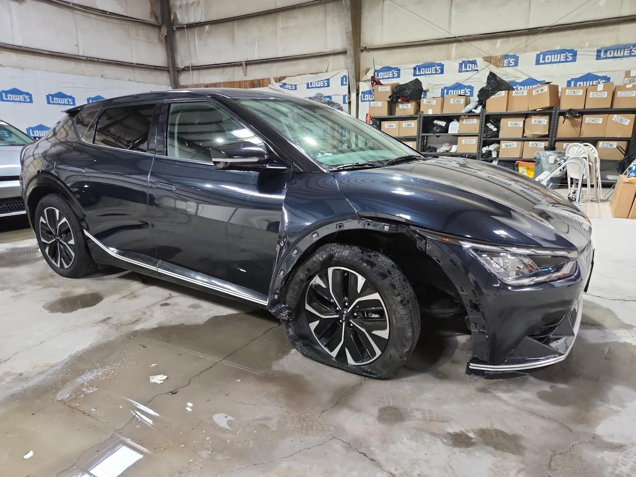 2023 Kia Ev6 Wind Blue vin: KNDC34LAXP5612087 Damage: Right Front Wheel Opening Mldg, Broken, Replacement Required