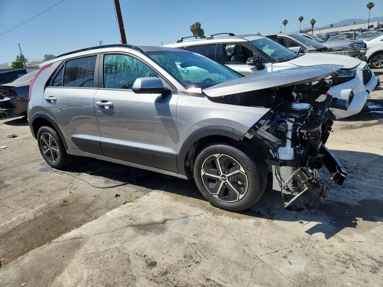 2025 Kia Niro Lx Gray vin: KNDCP3LE5S5278500 Damage: Hood, Dent(S) W/ Paint Dmg, > 12 Inches