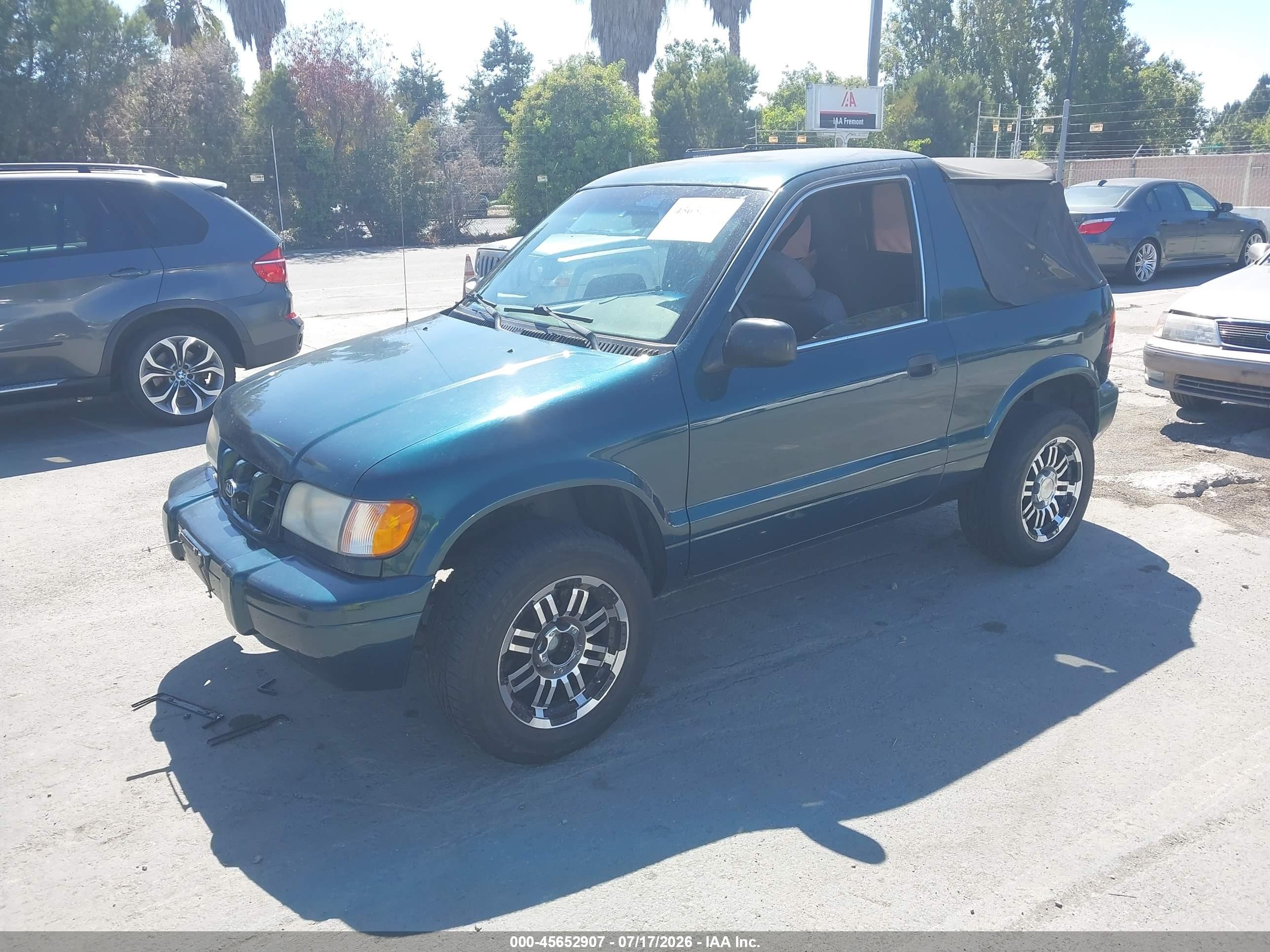 2001 Kia Sportage   Green vin: KNDJB623015705491