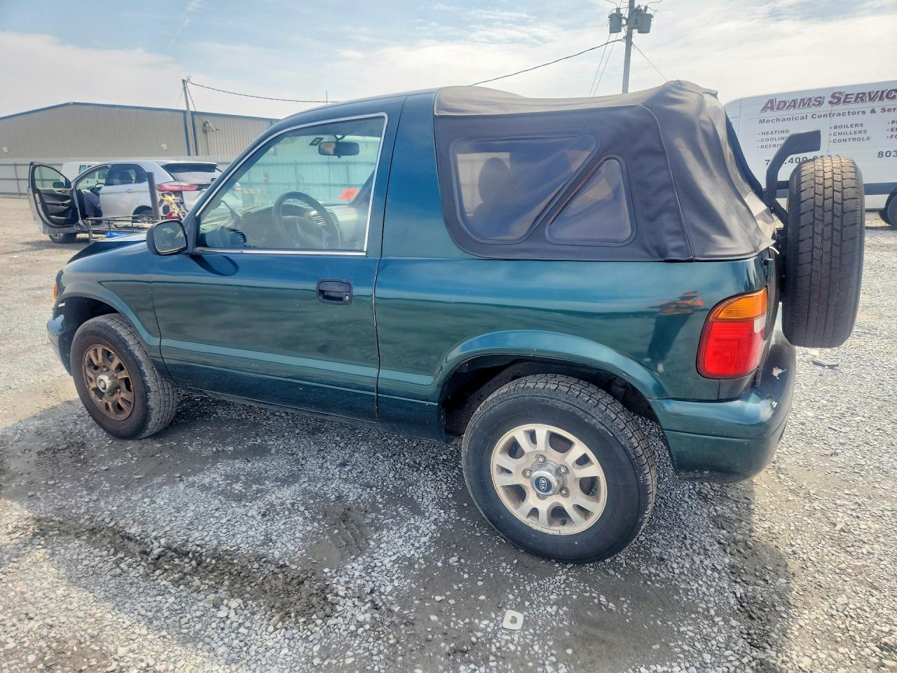 2002 Kia Sportage Base Green vin: KNDJB623325173526