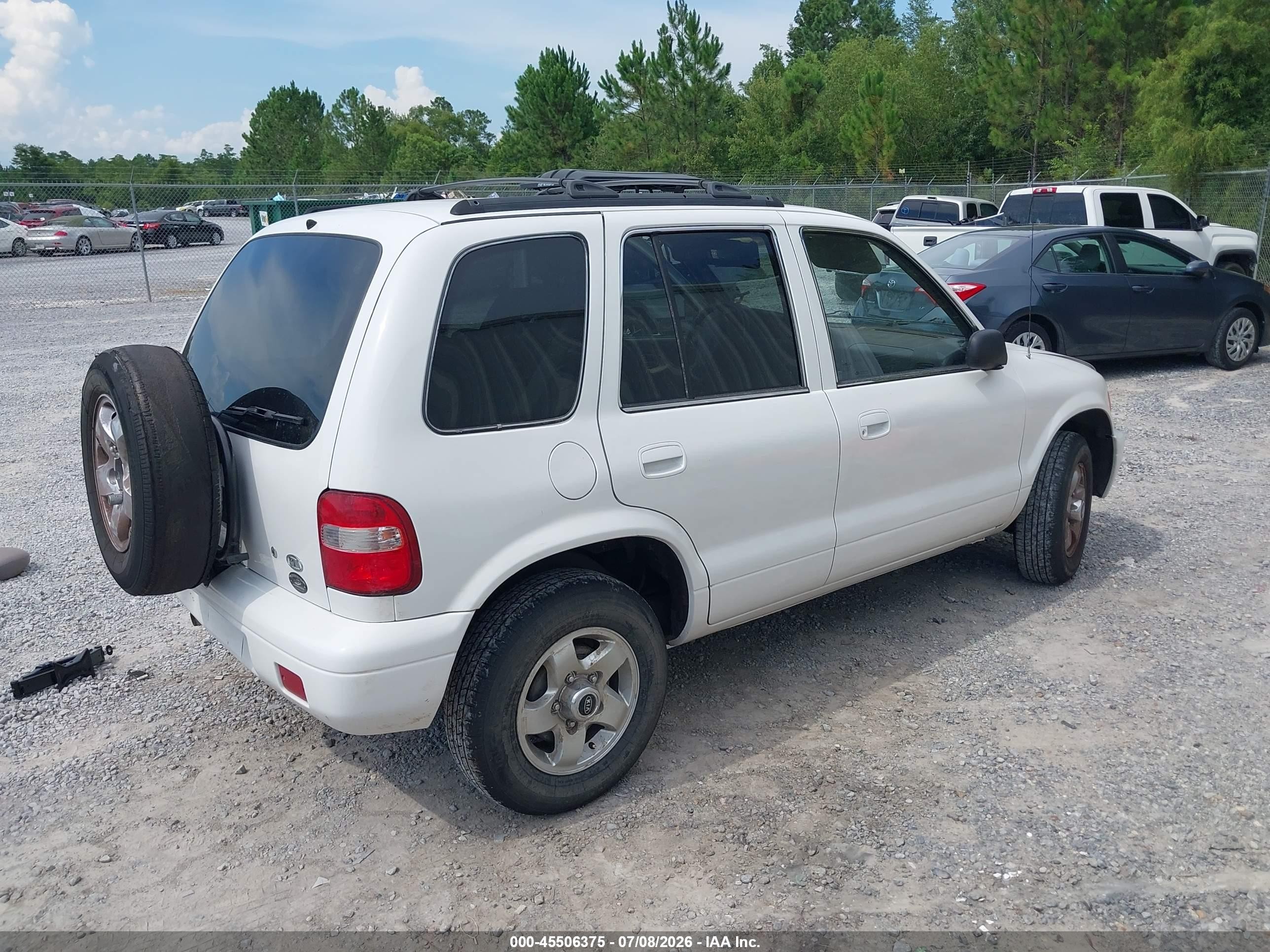 2002 Kia Sportage   White vin: KNDJB723325123795