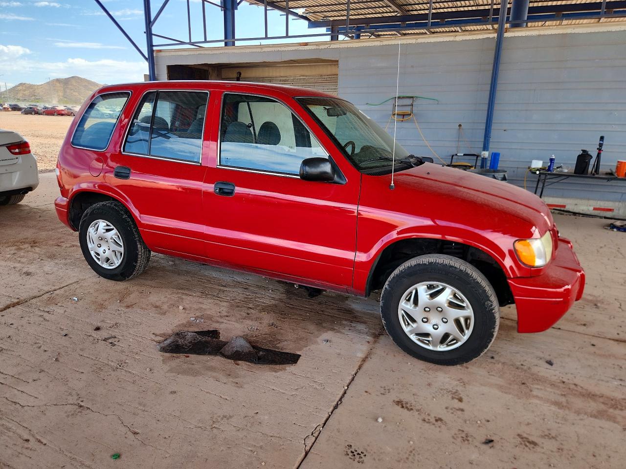 2001 Kia Sportage Base Red vin: KNDJB723415060186