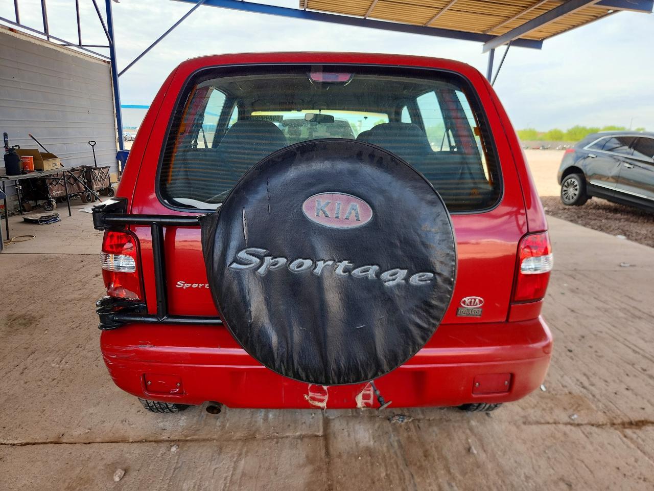 2001 Kia Sportage Base Red vin: KNDJB723415060186