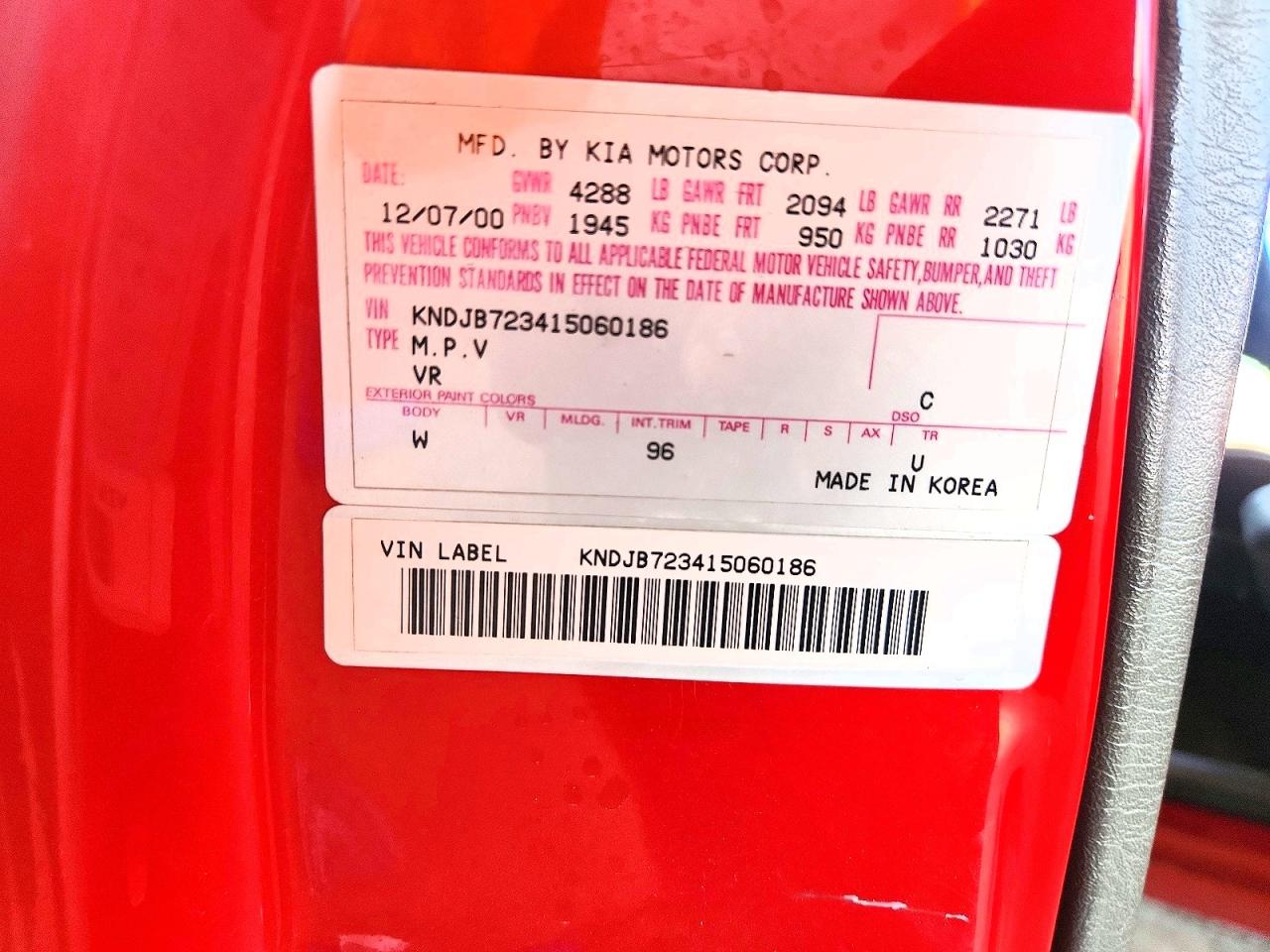2001 Kia Sportage Base Red vin: KNDJB723415060186