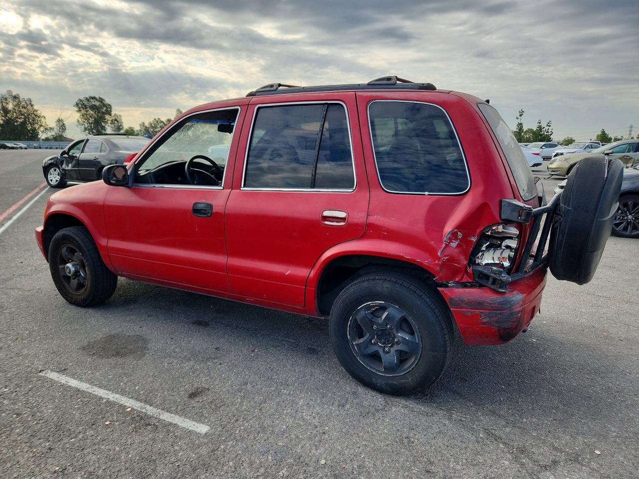 2002 Kia Sportage Base Красный vin: KNDJB723425148253