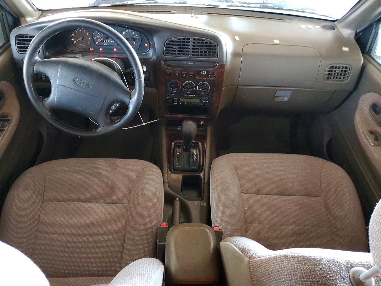2000 Kia Sportage Base White vin: KNDJB7238Y5674863