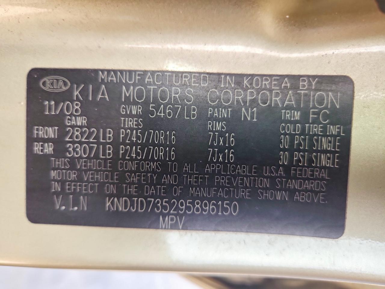 2009 Kia Sorento Base Gold vin: KNDJD735295896150