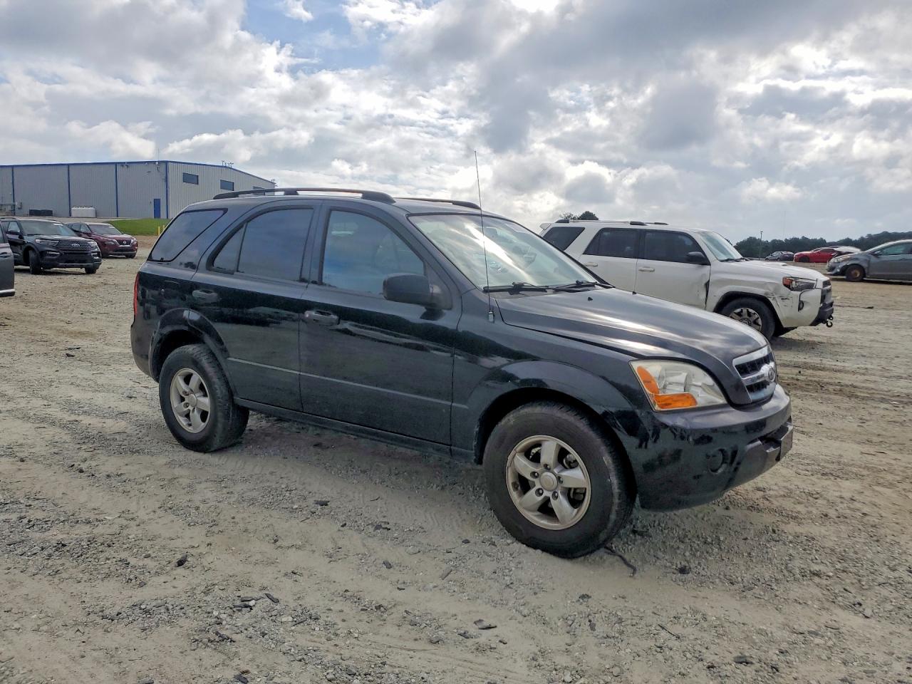 2009 Kia Sorento Base Black vin: KNDJD735995891799