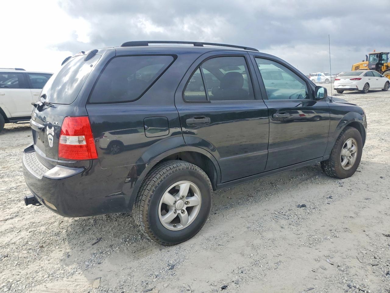 2009 Kia Sorento Base Black vin: KNDJD735995891799