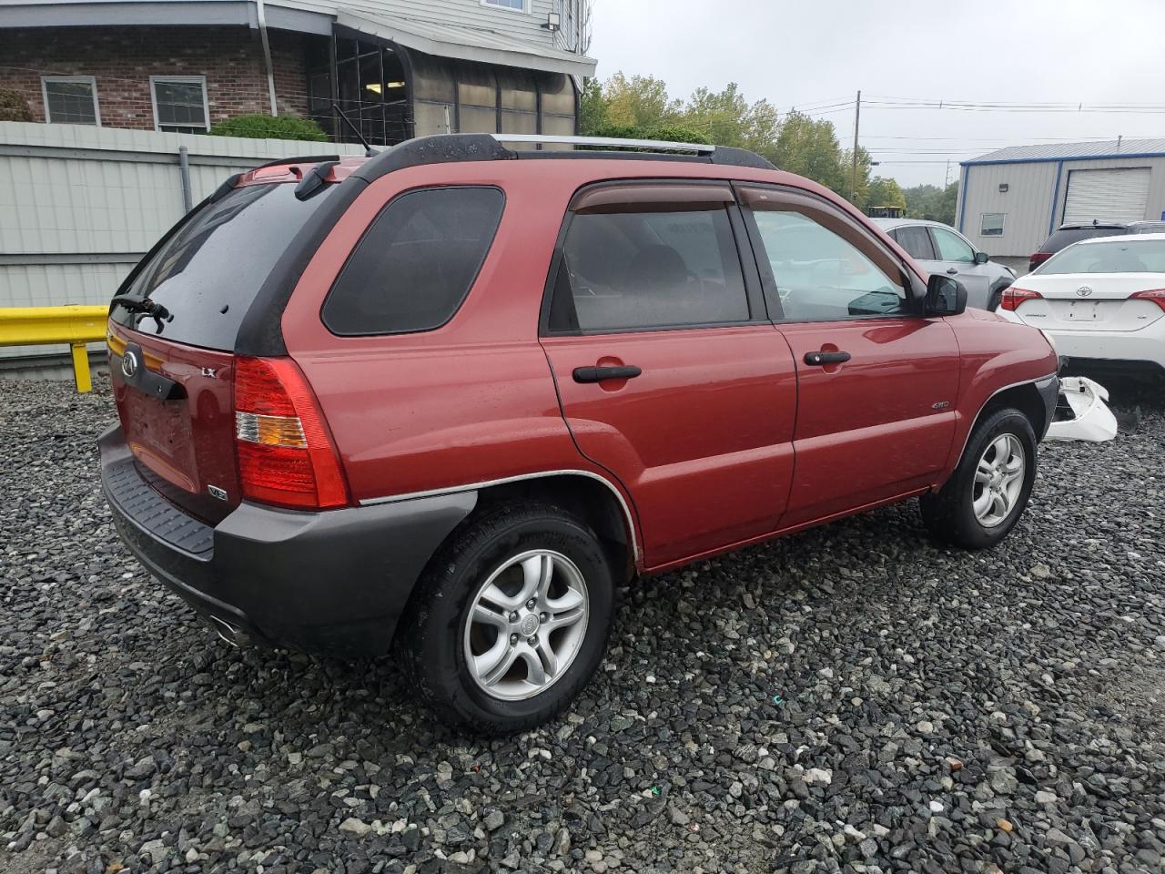 2006 Kia New Sportage Red vin: KNDJE723867291336