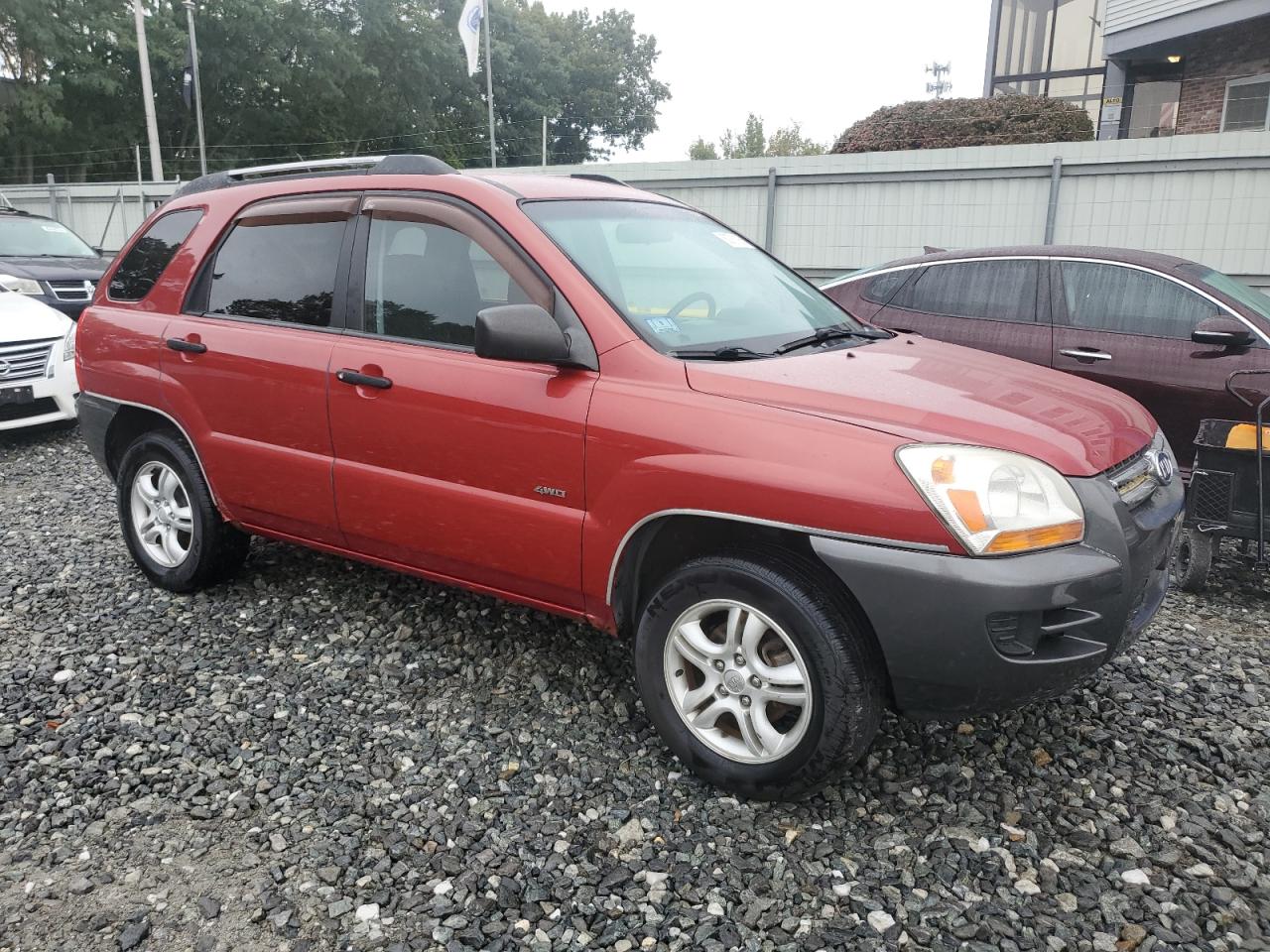 2006 Kia New Sportage Red vin: KNDJE723867291336