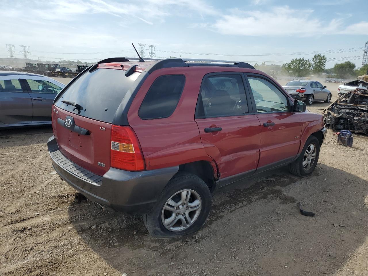 2005 Kia New Sportage Red vin: KNDJE723X57096448