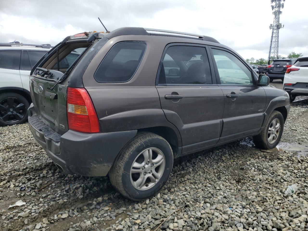 2006 Kia New Sportage Brown vin: KNDJE723X67233079