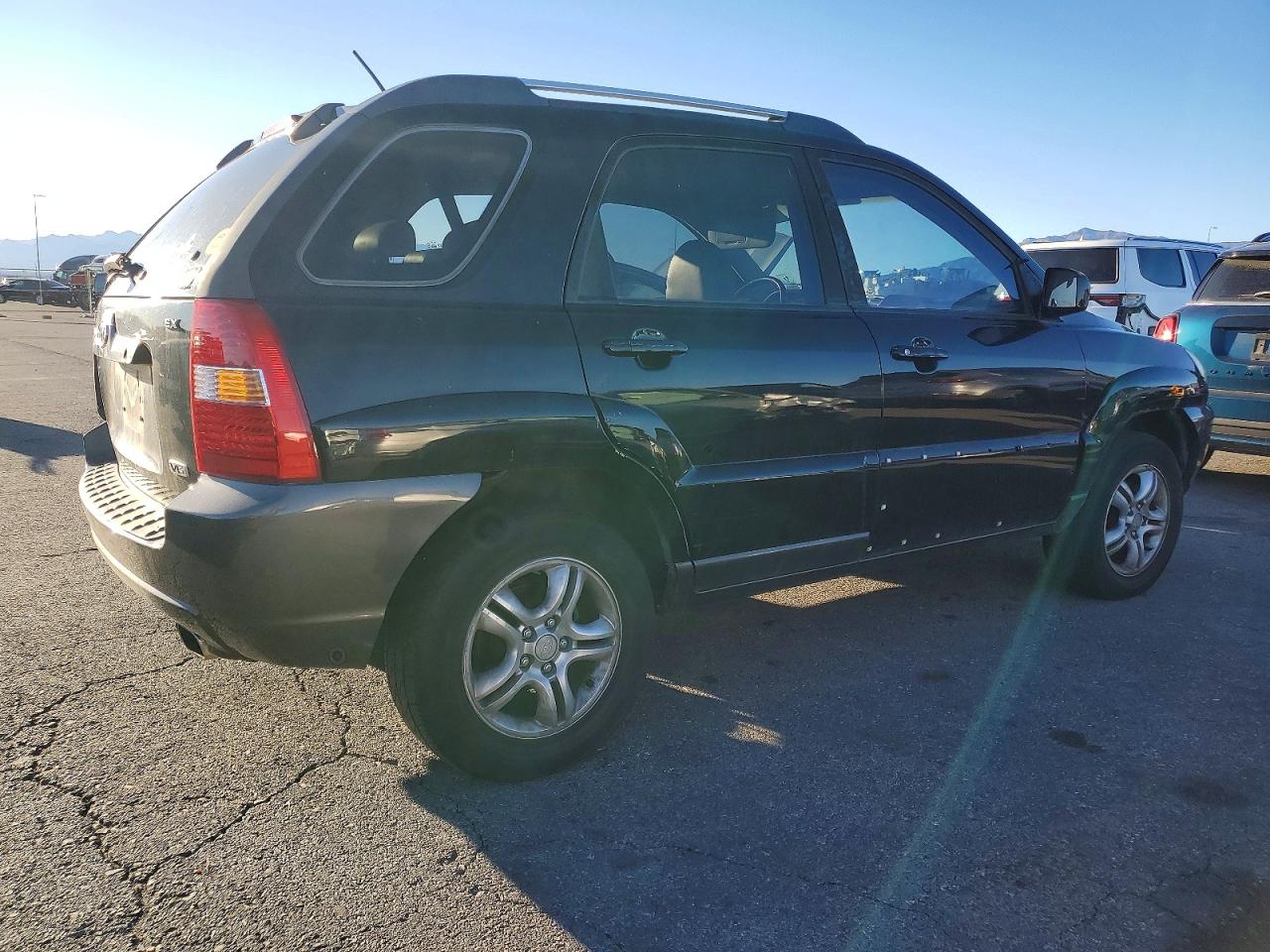 2005 Kia New Sportage Black vin: KNDJF723157043425