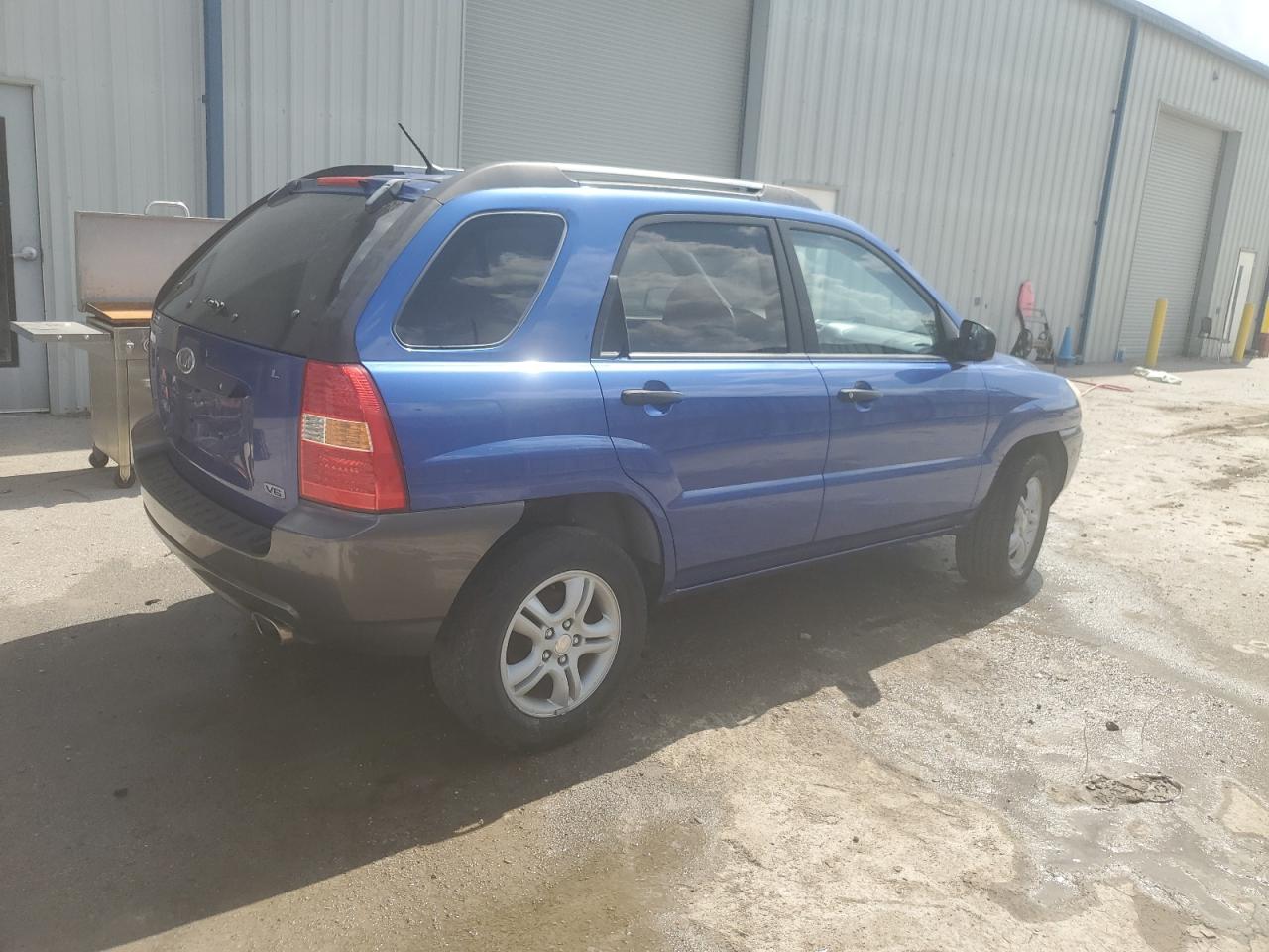 2006 Kia New Sportage    Blue vin: KNDJF723367263425
