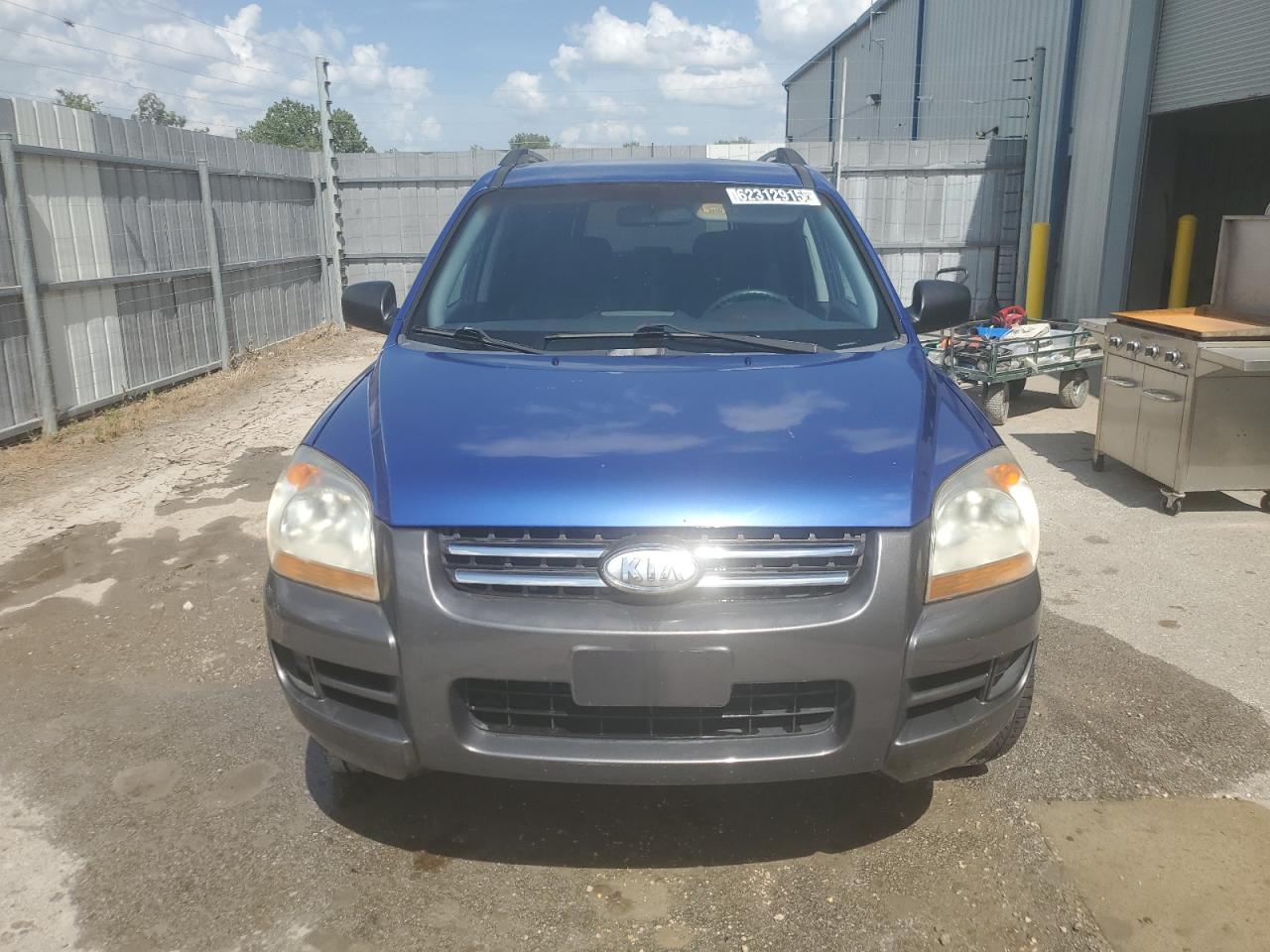 2006 Kia New Sportage    Blue vin: KNDJF723367263425