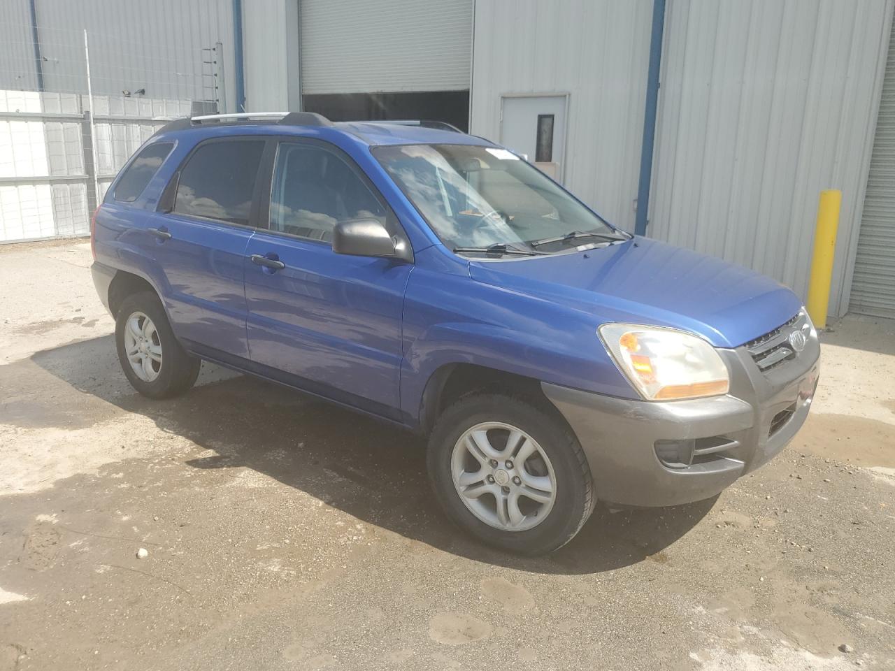 2006 Kia New Sportage    Blue vin: KNDJF723367263425