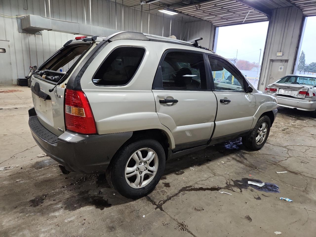 2005 Kia New Sportage Бежевый vin: KNDJF723457100183
