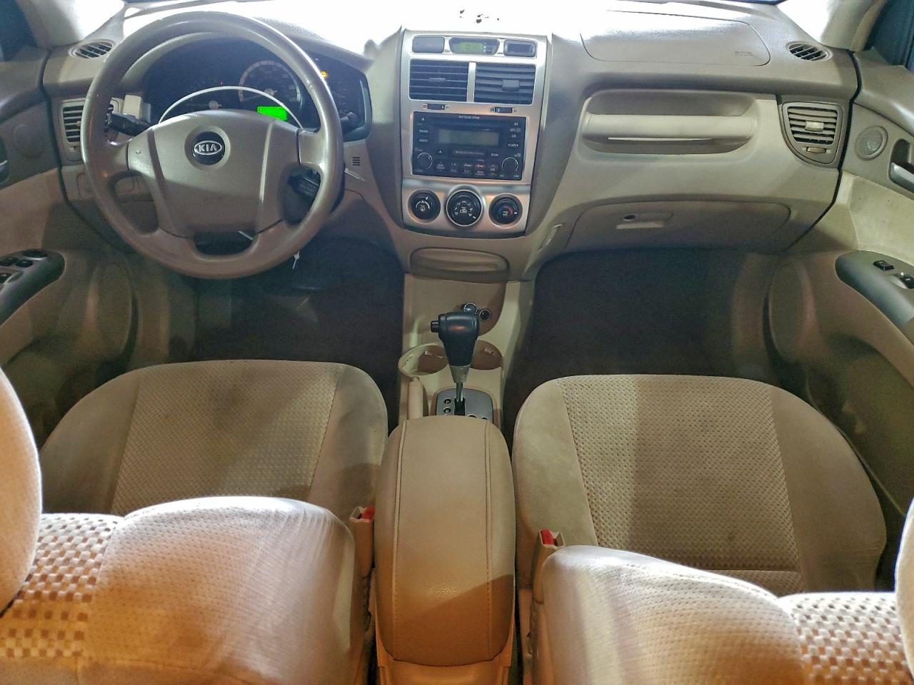 2005 Kia New Sportage Beige vin: KNDJF723557076590