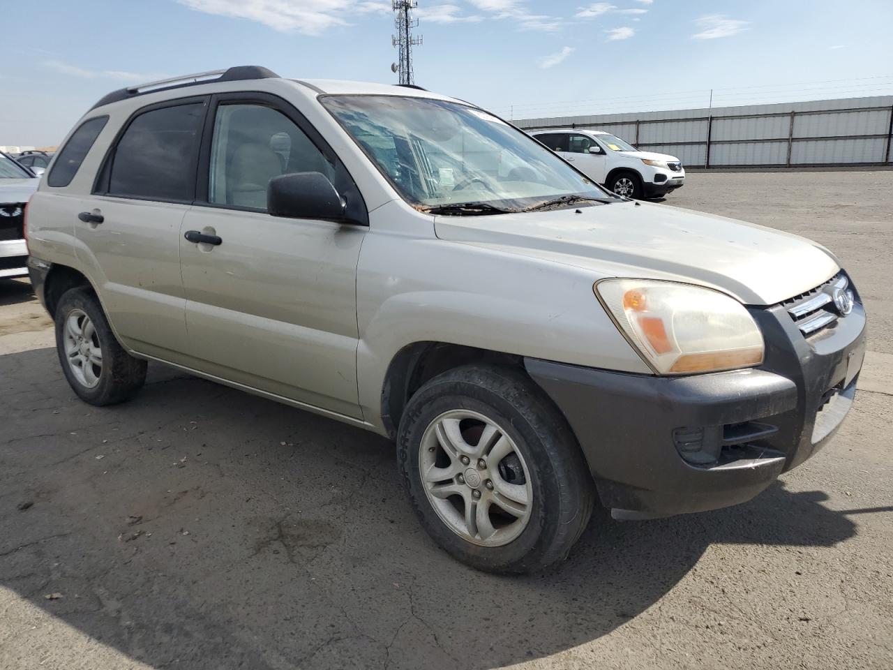 2006 Kia New Sportage Tan vin: KNDJF723967231076