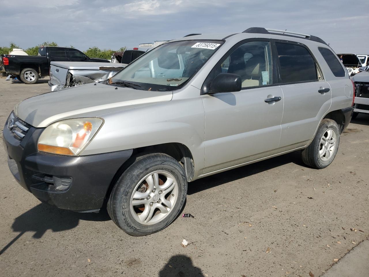 2006 Kia New Sportage Tan vin: KNDJF723967231076