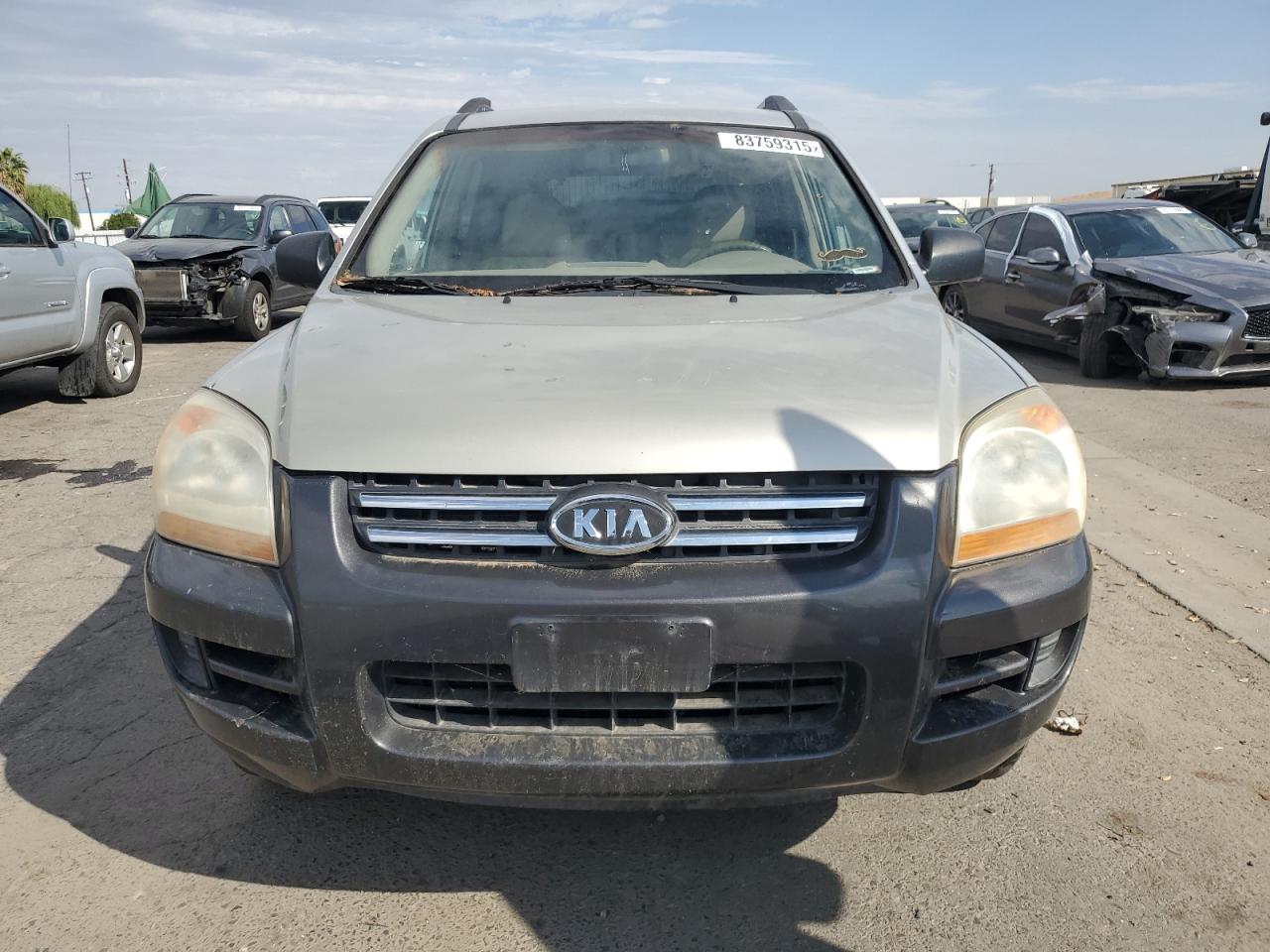 2006 Kia New Sportage Tan vin: KNDJF723967231076
