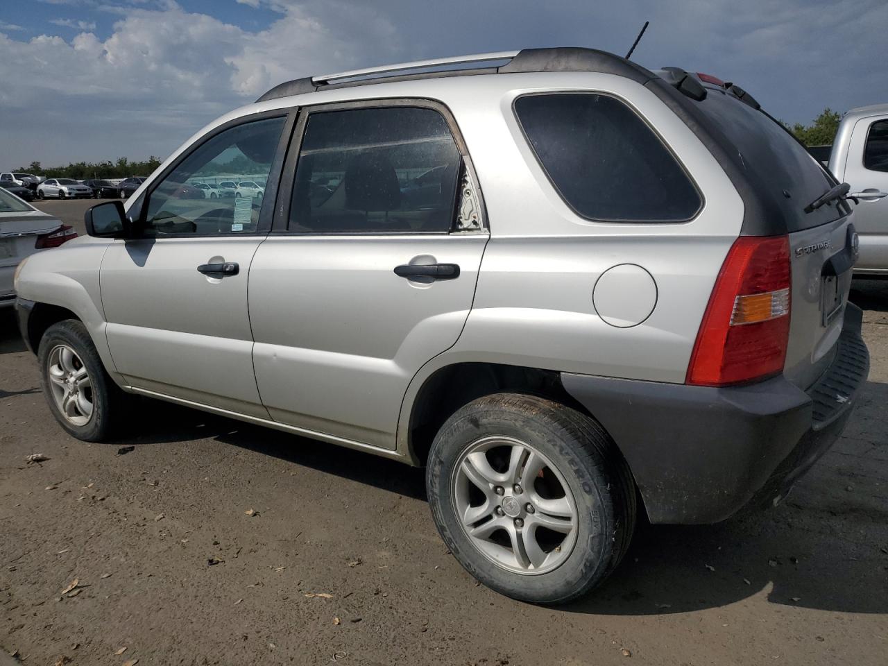 2006 Kia New Sportage Tan vin: KNDJF723967231076