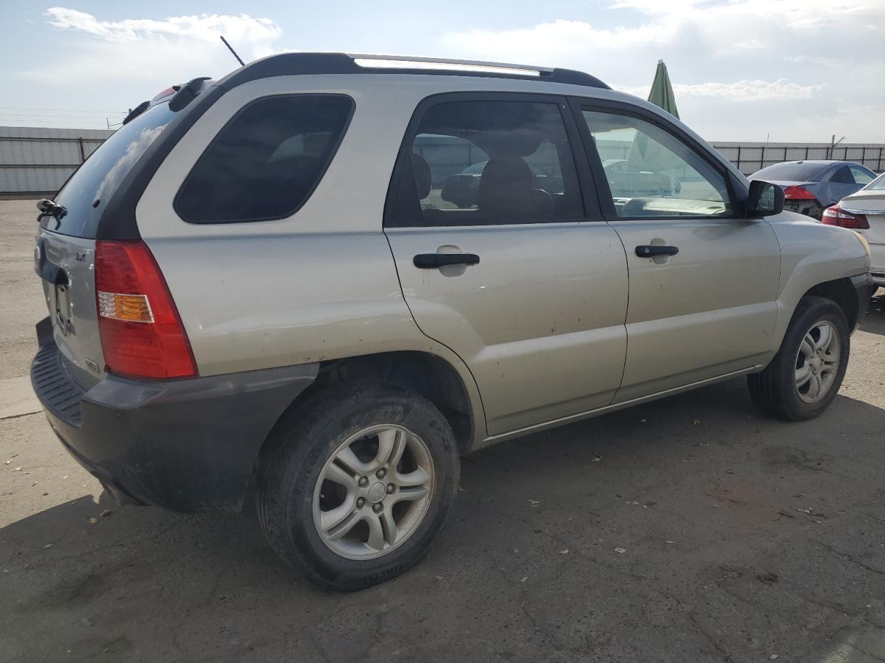 2006 Kia New Sportage Tan vin: KNDJF723967231076