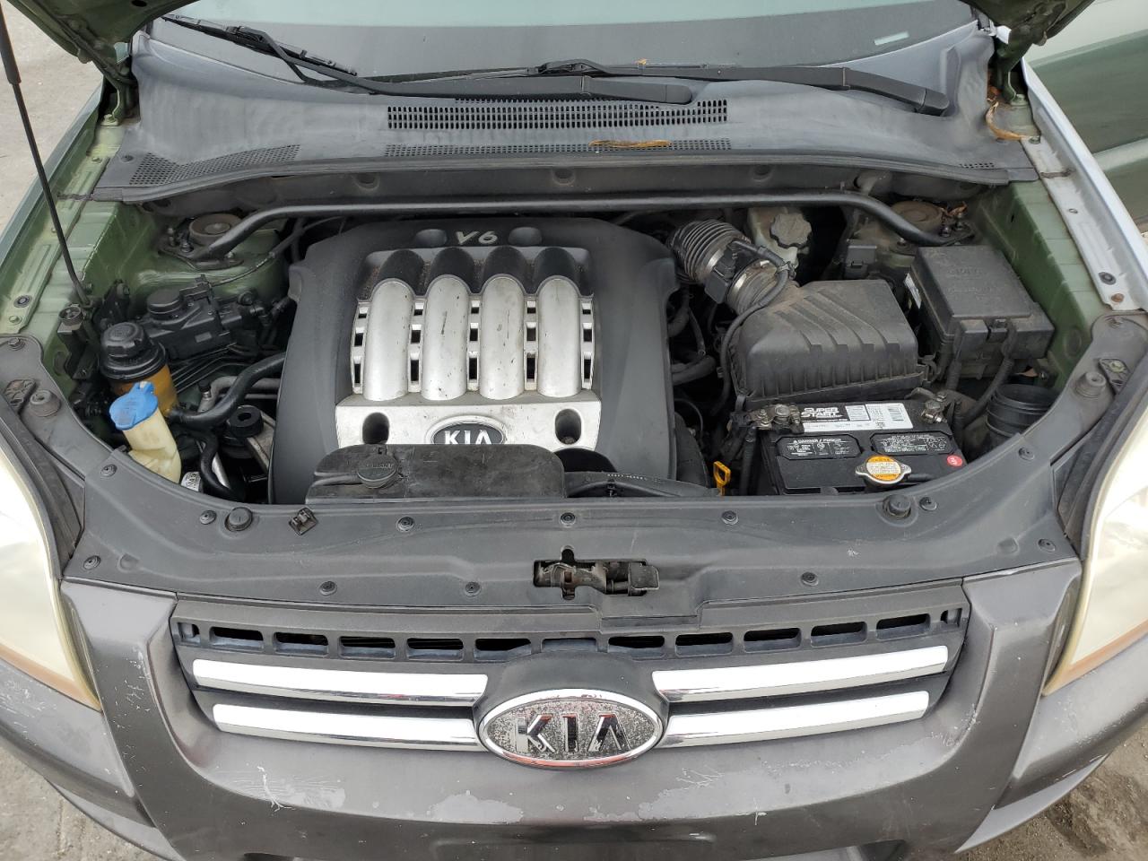 2006 Kia New Sportage    Green vin: KNDJF723X67244662