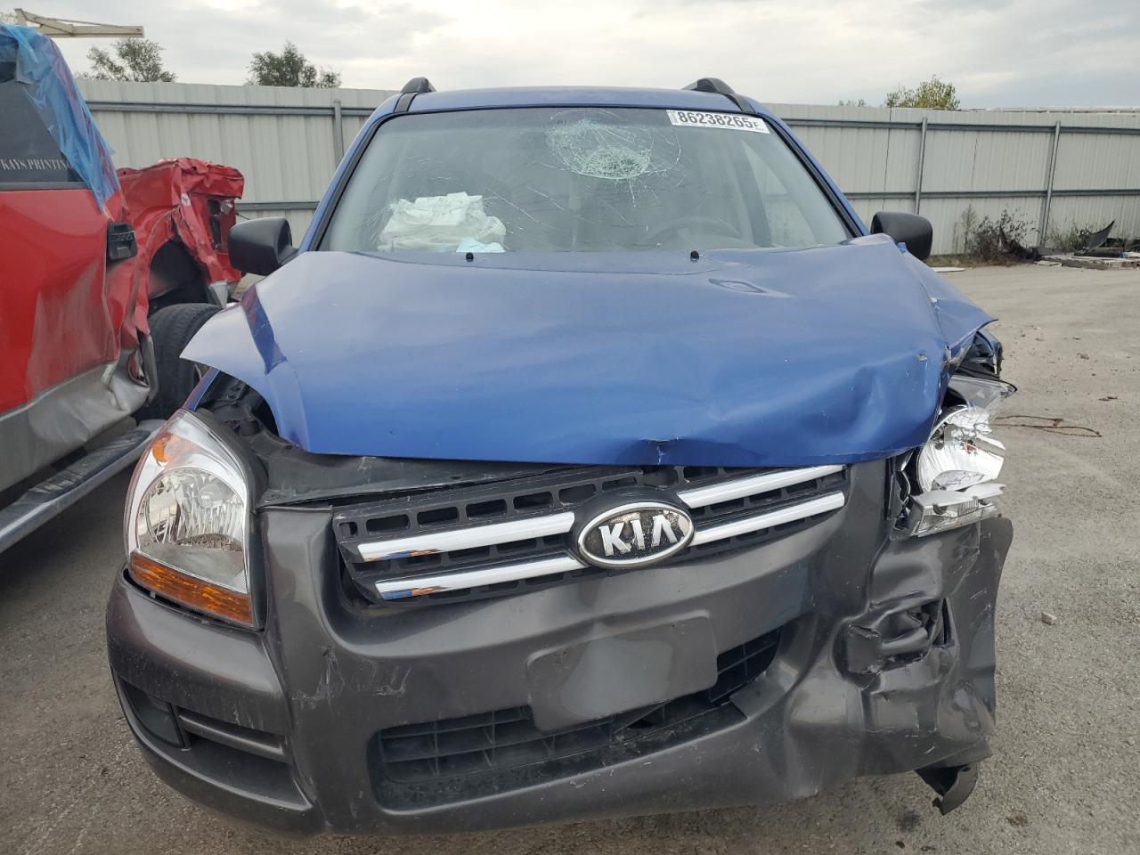 2006 Kia New Sportage Blue vin: KNDJF724267260914