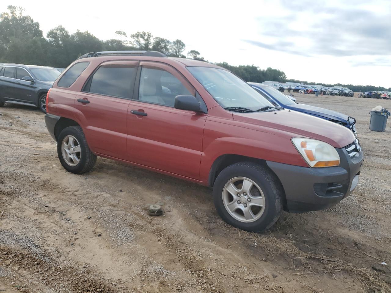 2005 Kia New Sportage Burgundy vin: KNDJF724357046609