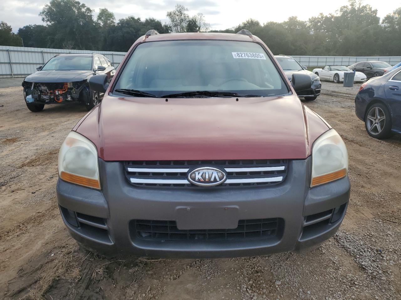 2005 Kia New Sportage Burgundy vin: KNDJF724357046609