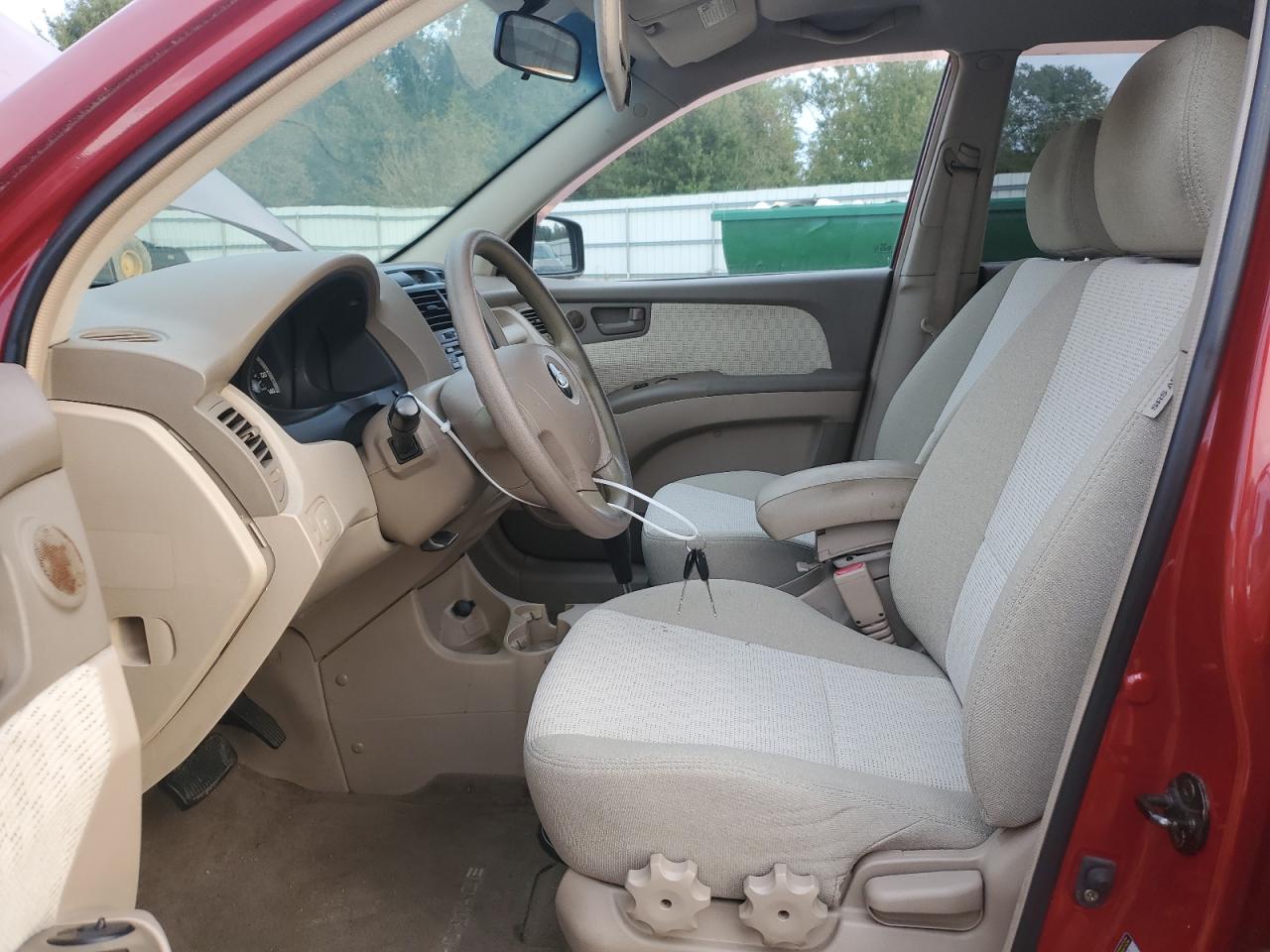 2005 Kia New Sportage Burgundy vin: KNDJF724357046609