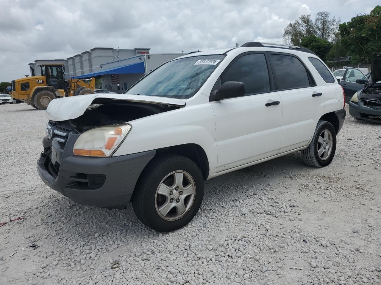 2006 Kia New Sportage    White vin: KNDJF724467186797