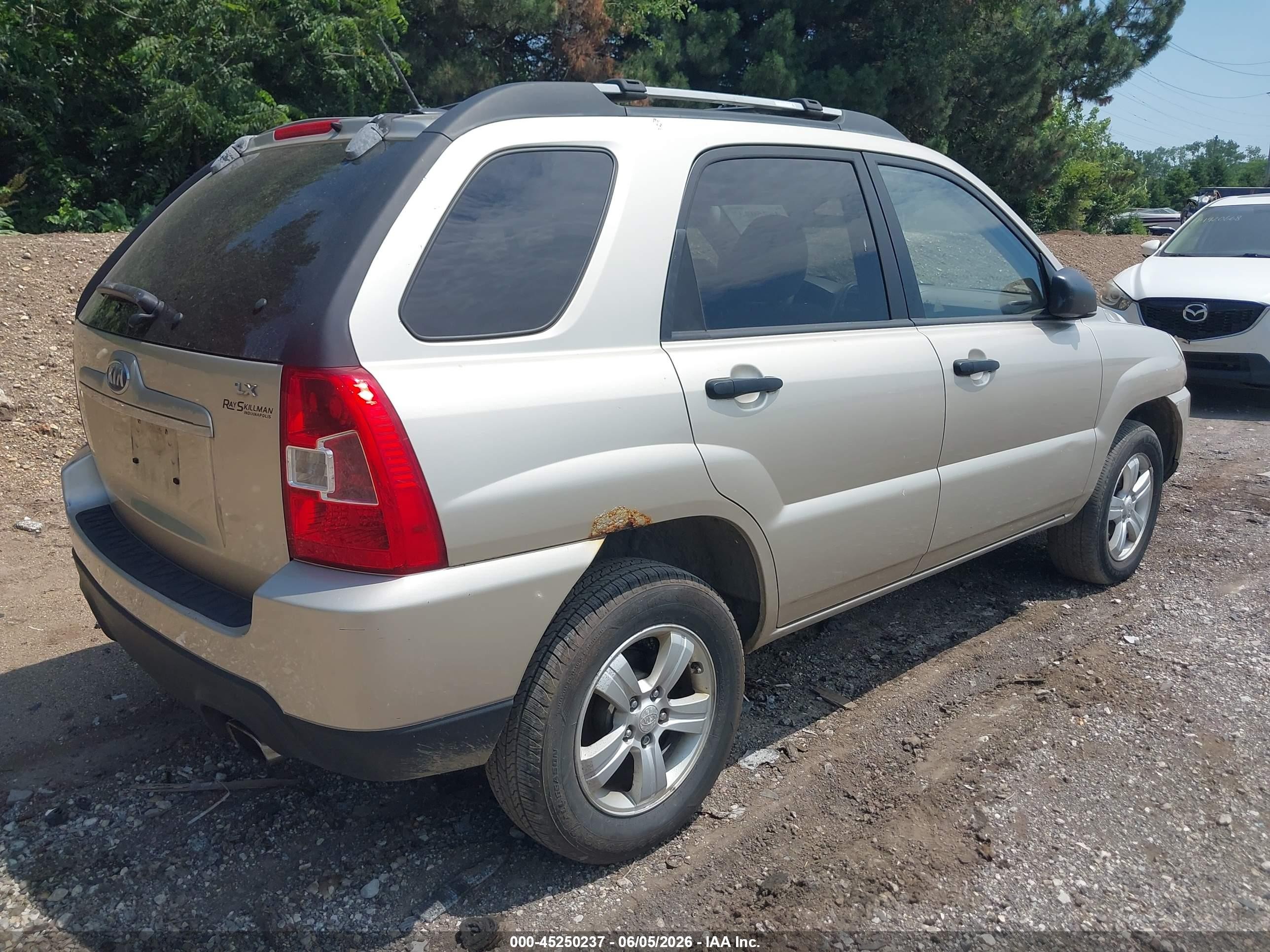2009 Kia Sportage Lx Beige vin: KNDJF724697568883