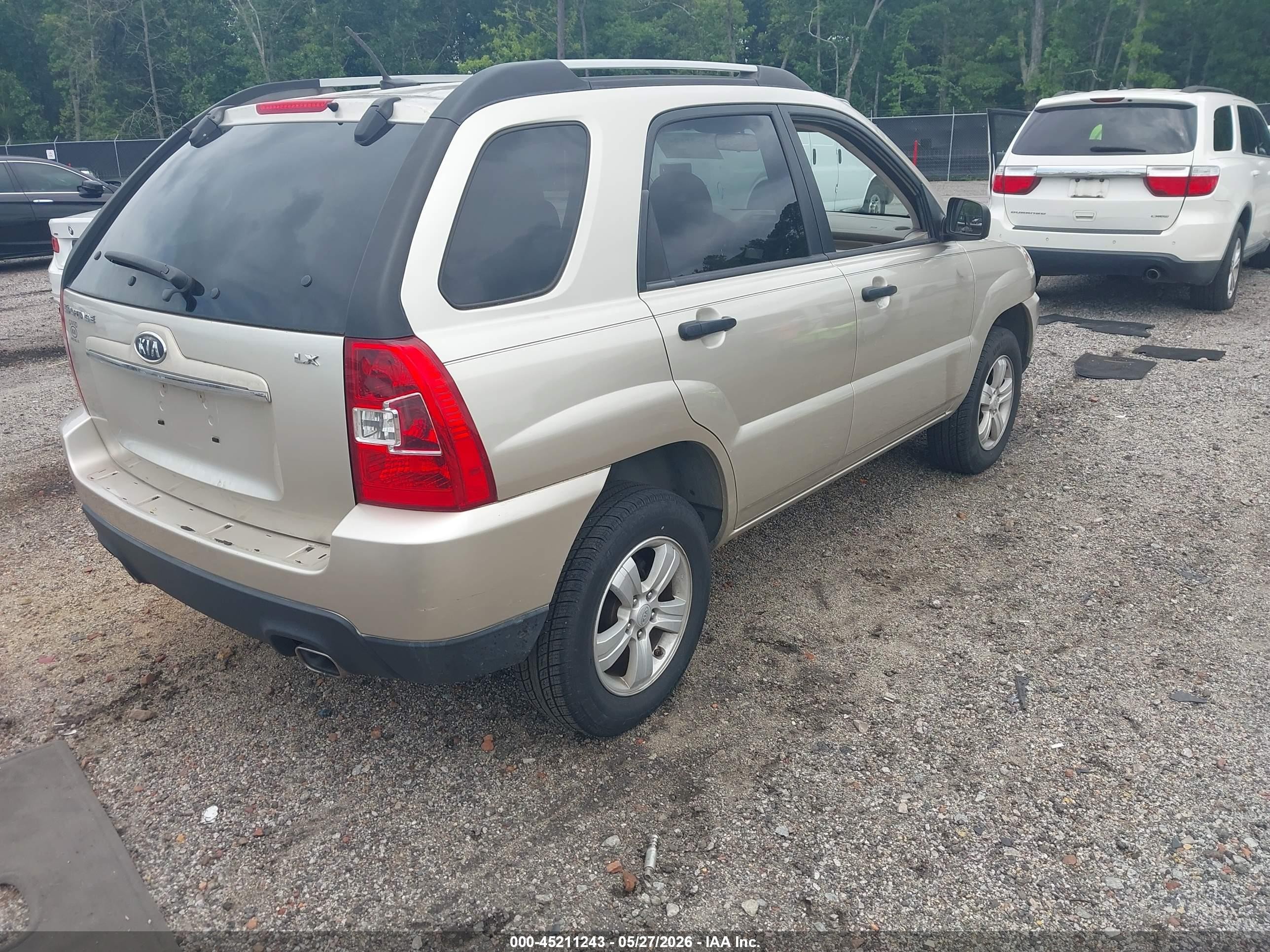 2009 Kia Sportage Lx Tan vin: KNDJF724697599907