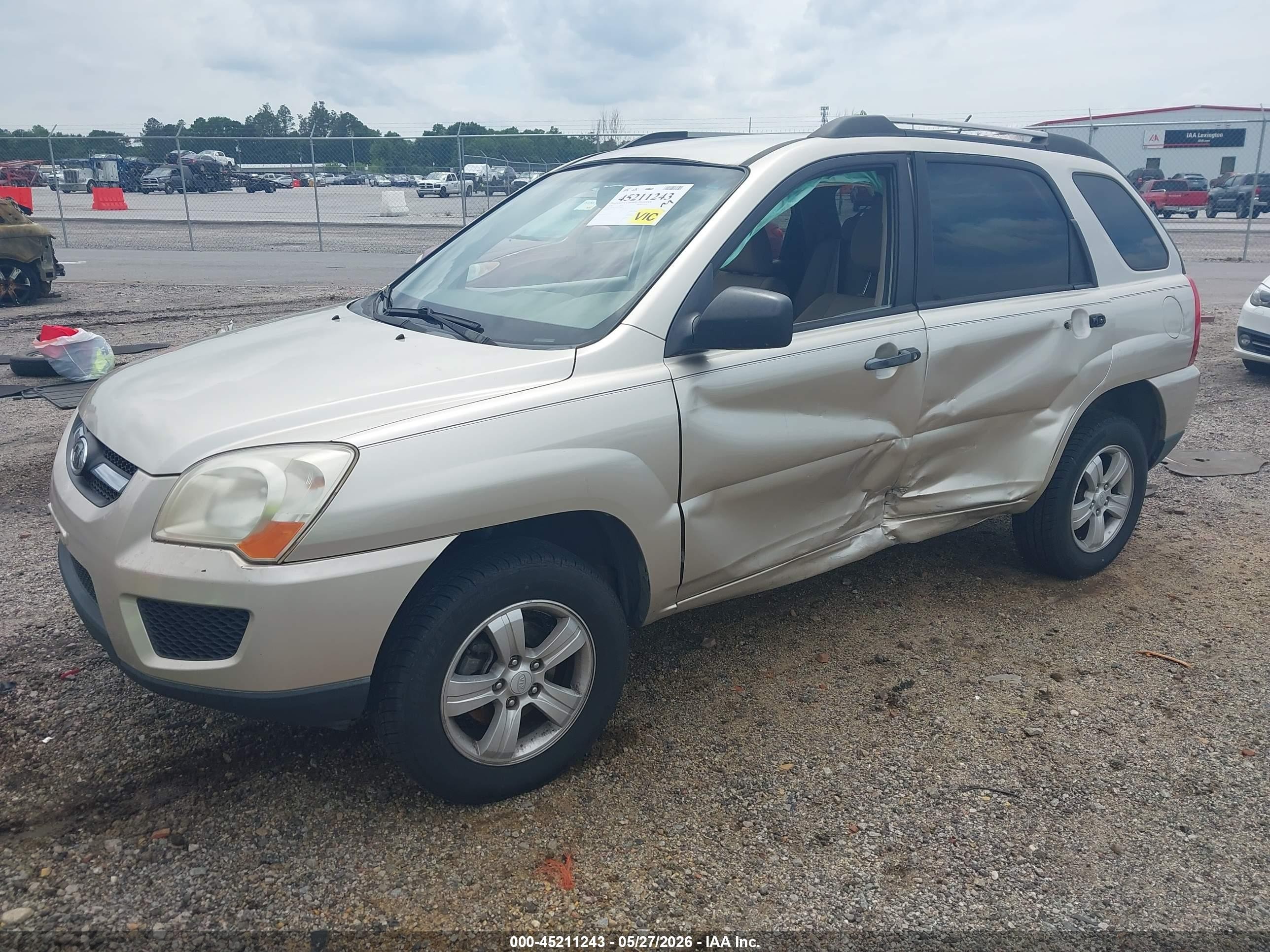 2009 Kia Sportage Lx Tan vin: KNDJF724697599907